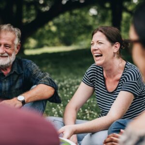 People laughing and engaging with their local community