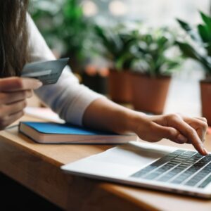woman purchasing her ticket online